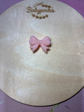 Noeud de papillon pailletée rose corail