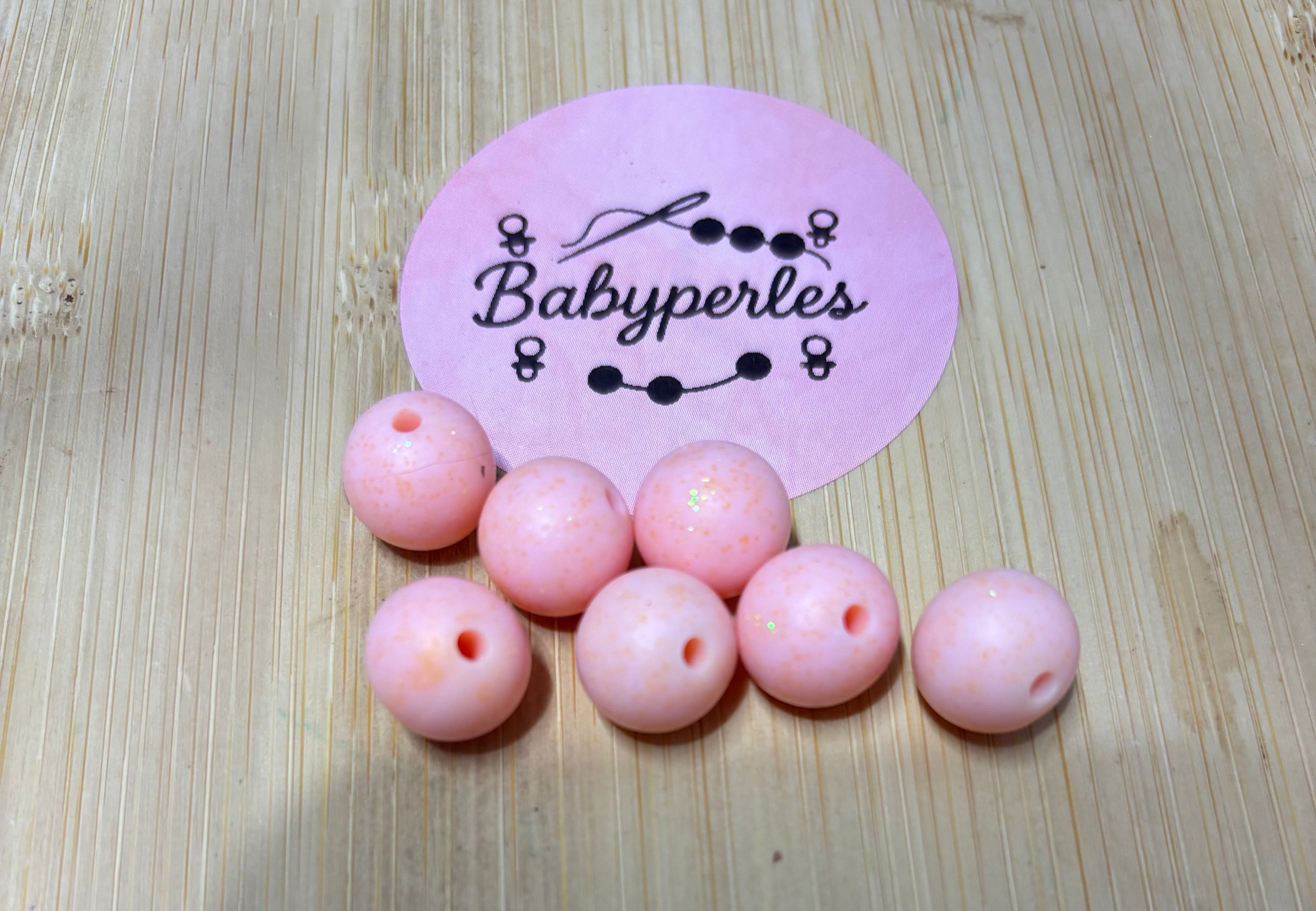 Perles 12 mm corail pailleté