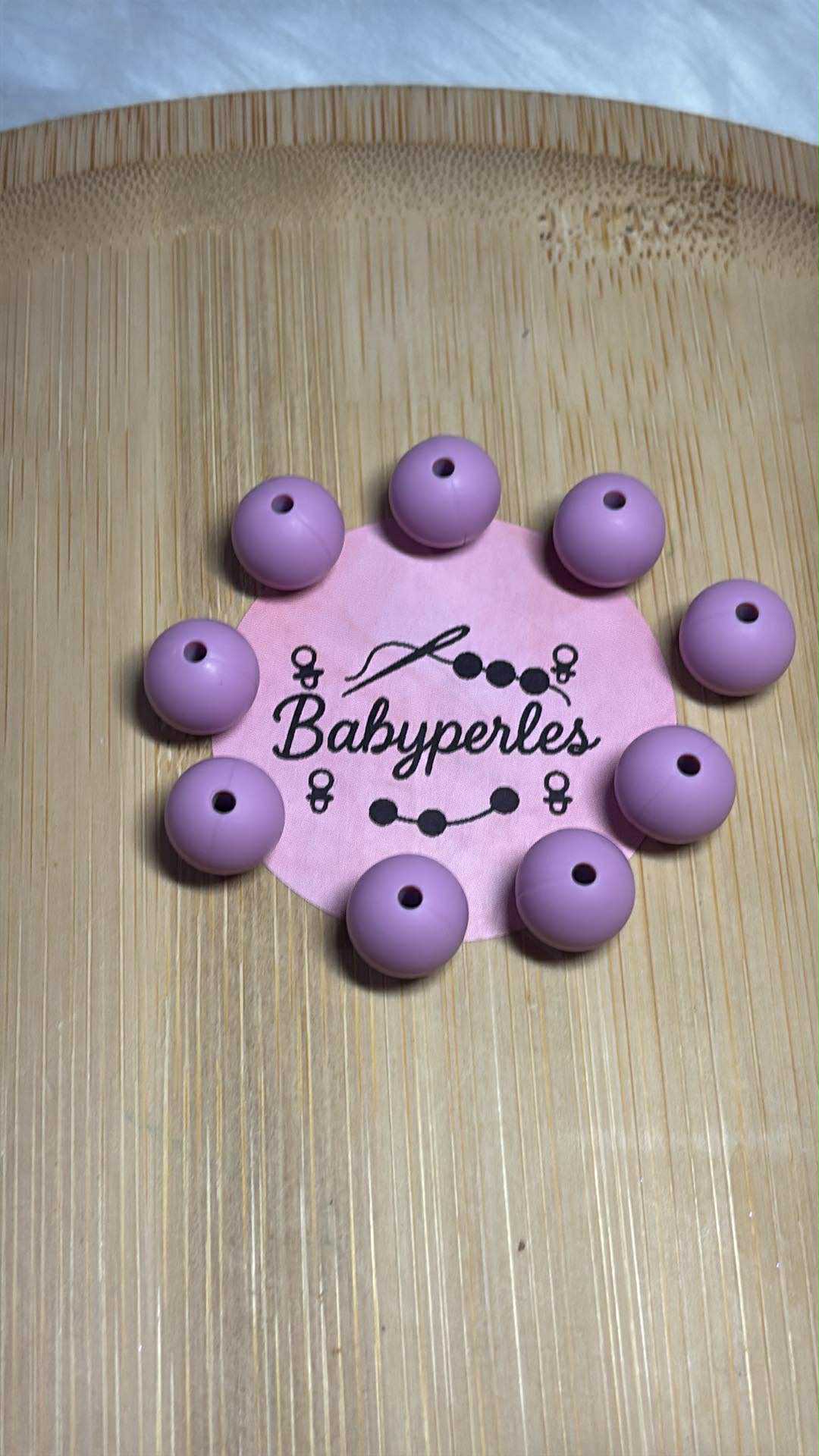 Perle 12 mm rose poudre de talc