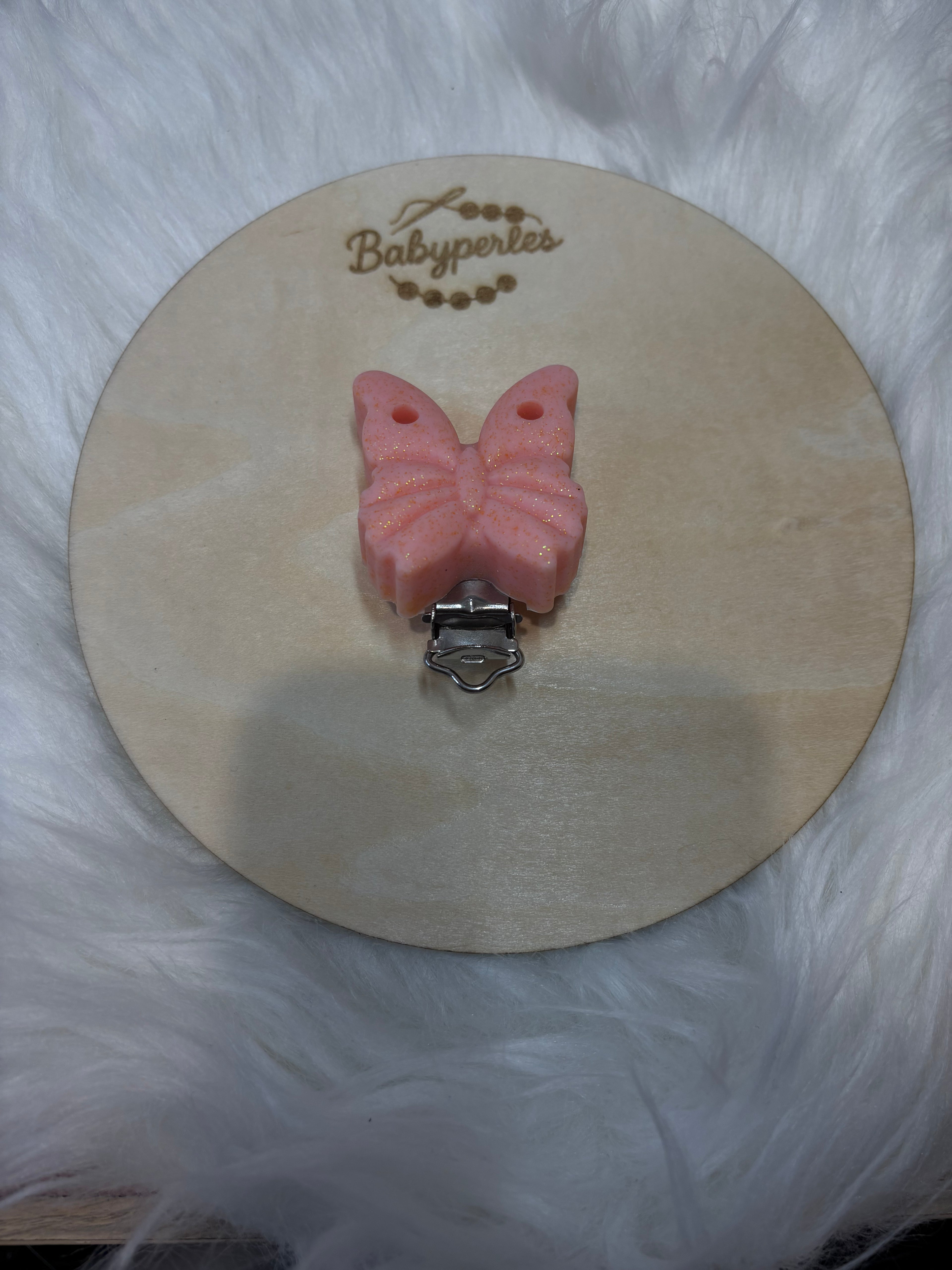 Clip papillon corail