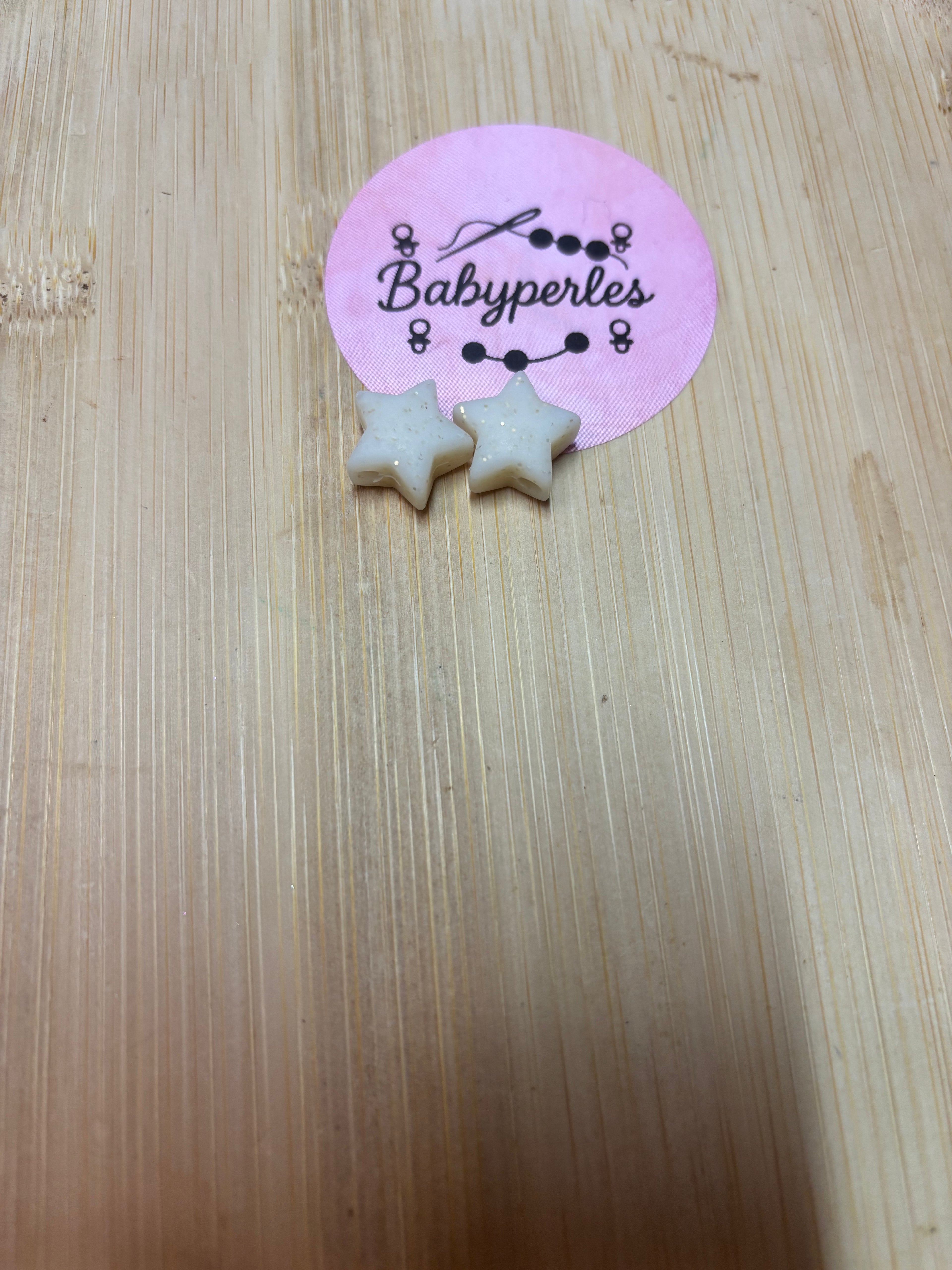 Étoile beige pailletée